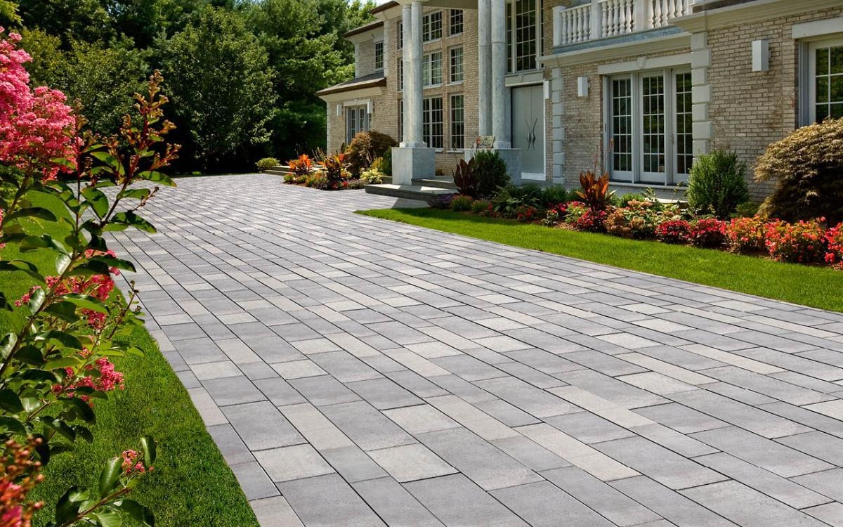 https://oldstationlandscapesupply.com/wp-content/uploads/2016/12/Why-Concrete-Pavers-are-Better-for-Driveways-and-Patios.jpg?utm_source=chatgpt.com